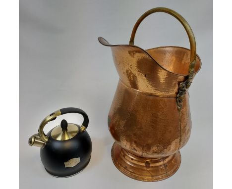 A Vintage brass and copper coal scuttle and Susteas stove top whistling tea kettle. 