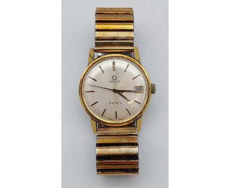 A Gent's Vintage Omega Geneve Seamaster watch. In a working condition. 