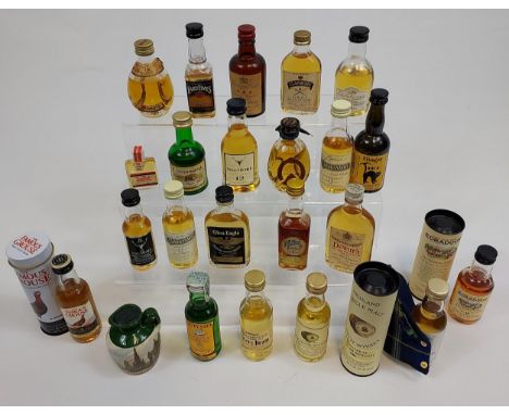 A Collection of vintage whisky miniatures to include Edradour, Dewars, Cutty Sark, Dalmore, Cragganmore, Glen Eagle, Ginger T
