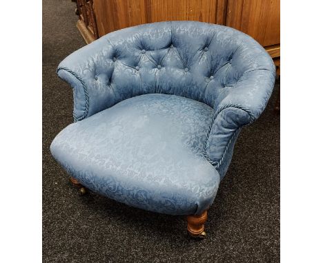 A 19th century button back tub chair. 