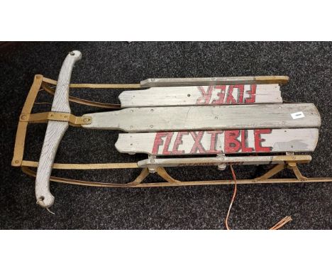A Vintage childs Flexible Flyer sledge. 