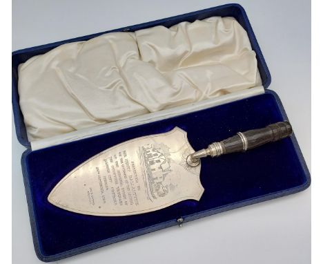 An Edinburgh Silver and wood presentation trowel with a fitted box. Engraved 'Presented to Sir Henry Ballantyne on the occasi