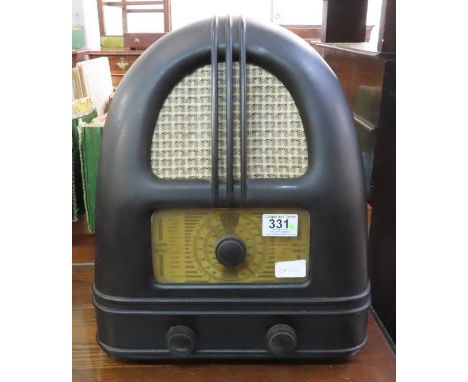 A 1930's bakelite cased Philco radio, the speaker above the dial, 37cm high