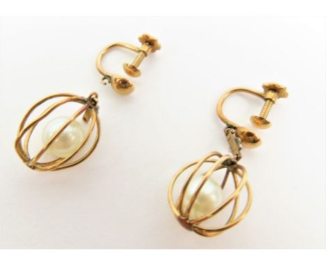 A pair of cage set cultured pearl earrings, stamped ’585’ possibly Scandinavian, 3 grams gross 