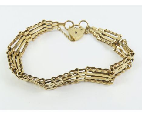 A 9 carat gold four bar gate bracelet, 7.1 grams gross 