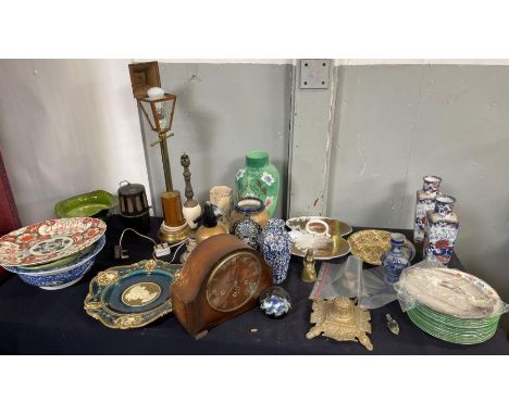 A quantity of  assorted items to include an early 20th century car engine heater, oak cased mantel clock, decorative vases an