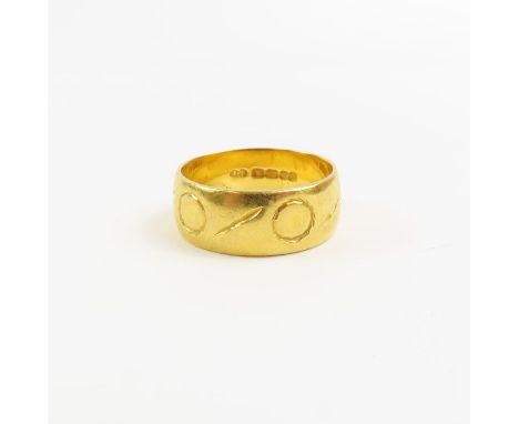 A 22 carat gold patterned wedding ring, finger size K 1/2 centre, 5.8 grams gross 