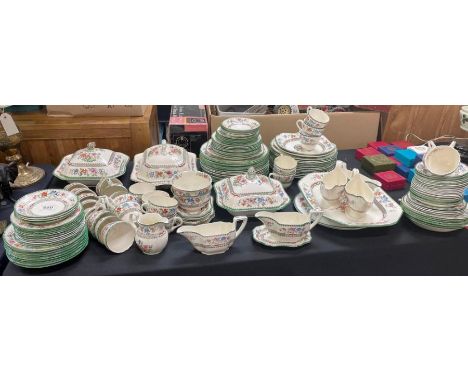 A Spode Chinese Rose pattern extensive dinner service including veg dishes and covers, sauce boats, tea set and many plates  