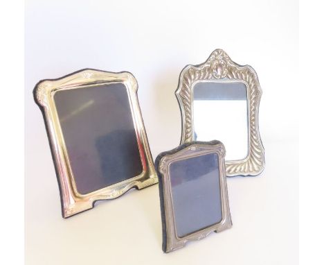 Three modern silver easel backed picture frames 