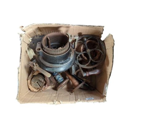 A vintage sock knitting machine, with various accessories and manual