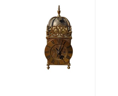 A brass lantern clock with short pendulum and key  35cm high 