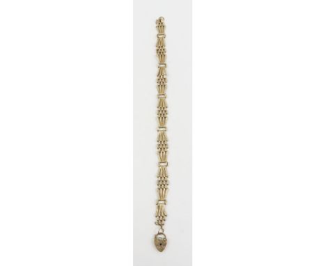 A 9ct gold fancy gate link bracelet with heart padlock, 19.5cm long, 7.45g gross