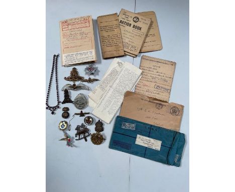 WWII ephemera and badges – Discharge papers and other documents relating to R J Spackman RAF together with brass RAF cap badg
