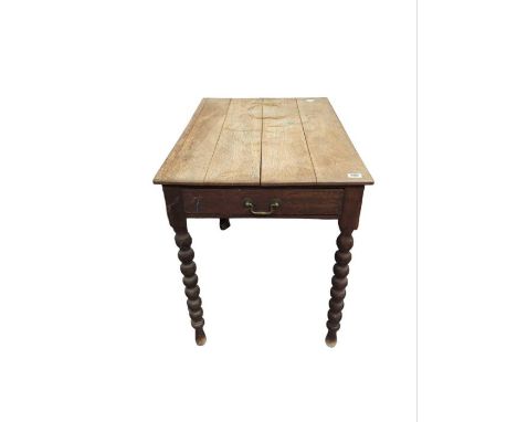 A Victorian rectangular oak table with end drawer and on bobbin supports, 78cm high 91cm x 62.5cm 