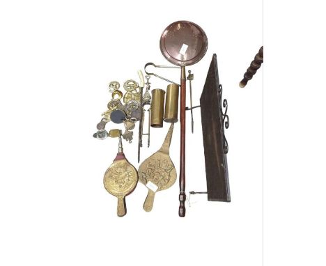 A 19th century copper warming pan, two WWI brass shell cases with engraved decoration dated 1919, bellows, fire screen and ot