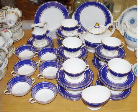 A Royal Doulton Royal Windsor pattern part tea service for ten comprising teacups, saucers, side plates, sandwich plate, suga