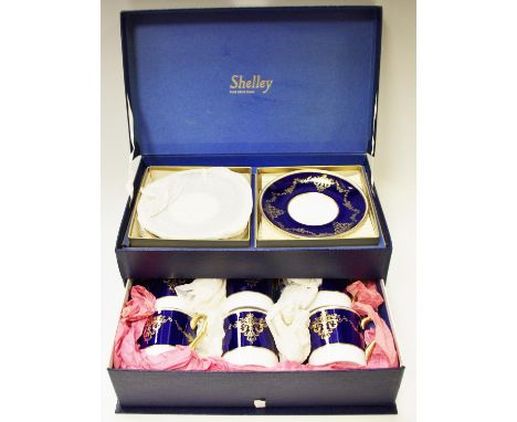 A Shelley coffee set for six comprising cans and saucers in original box 