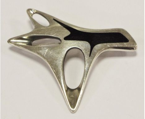 A Henning Koppel for Georg Jensen sterling and black enamel modernist brooch, design no. 323, 58mm, 29.7 g gross 