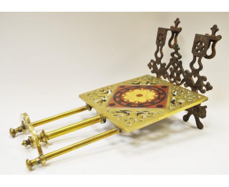 A Victorian cast iron and brass kettle stand inset with W.Godwin tile. 