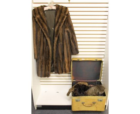 A case of vintage mink and other fur hats, coat etc