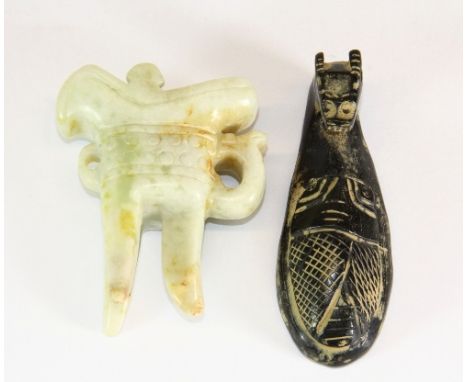 A Chinese carved black jade / hardstone buckle (8cm) with a jade / hardstone tripod censor (7cm)