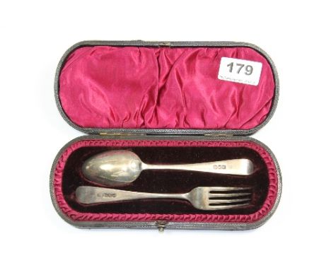 A cased hallmarked silver christening spoon and fork