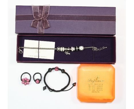 A Tresor Paris fashion bangle and 2 rings with an eternal love bracelet
