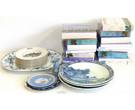 A quantity of mainly boxed Wedgwood Christmas plates, three Boch (Belgium" Delfts chargers, Newstone "Passion Flower" meat pl