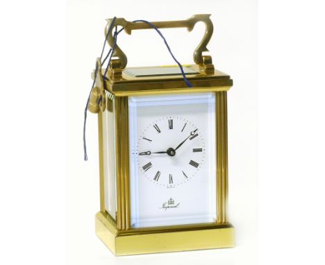 Imperial brass carriage clock, 8 day 11 jewels, bevelled glass, movement by Fenna London. Condition reports are not available