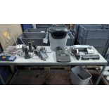 The contents of a table of office equipment including Switches, Telephones, Printer, Shredder, Lamin