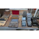 9 off Boxes of assorted calibration and measuring related items