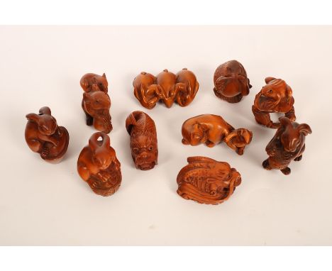 Ten Japanese carved boxwood netsuke, 20th Century, depicting rabbits and other creatures/Provenance: The Estate of Anthony J 
