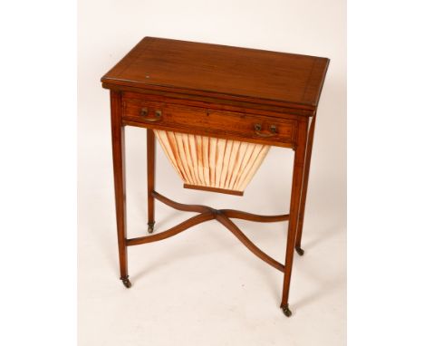 A late 19th Century satinwood work/card table, the crossbanded fold-over top with baize lined interior above a fitted drawer 