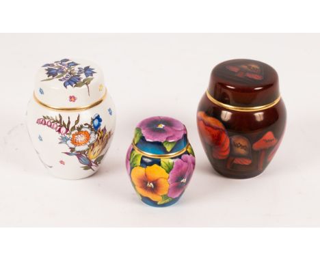 A Moorcroft Marlborough pattern enamel ginger jar, a flambé ginger jar and a pansy pot CONDITION REPORT: Pansy pot has small 