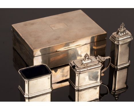 A rectangular silver cigarette box, JS Ltd., Birmingham 1941, with engine turned decoration and a three-piece cruet with glas