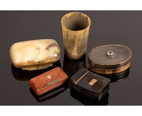 An early 19th Century tortoiseshell snuff box of curved rectangular form, the hinged cover with yellow metal panel initialled