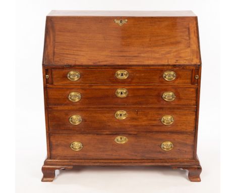 A George III mahogany bureau, the sloping hinged fall enclosing a fitted interior below four long graduated drawers on ogee b