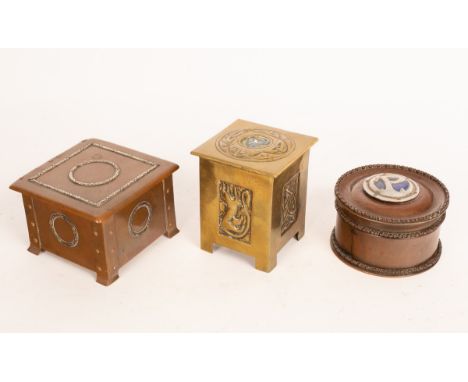 A circular copper money box, initialled 'P', 12cm diameter, a copper cigarette box decorated circular laurels, 8cm high x 12c