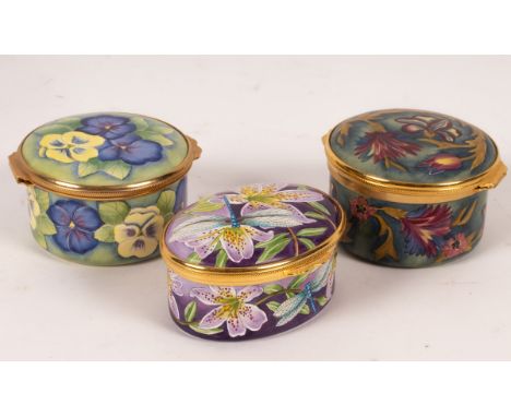 Three Moorcroft enamel boxes, Stargazer, Pansy and Acanthus CONDITION REPORT: Good condition.