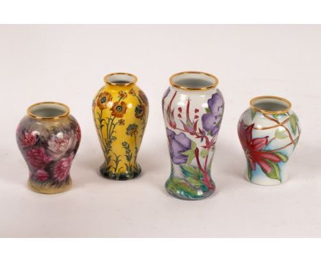 Four Moorcroft enamel vases, Peony, Yellow Poppy, Meadow Cranesbill and Passion Flower CONDITION REPORT: Good condition.