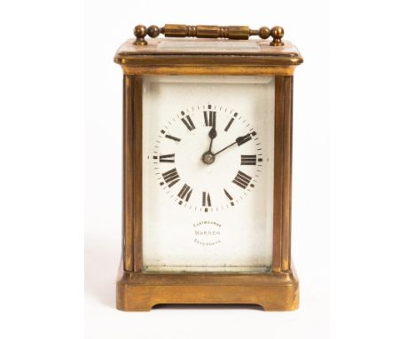 A gilt brass cased carriage clock, the white enamel dial signed Warren, Eastbourne, Sevenoaks, fitted a French movement, 15cm