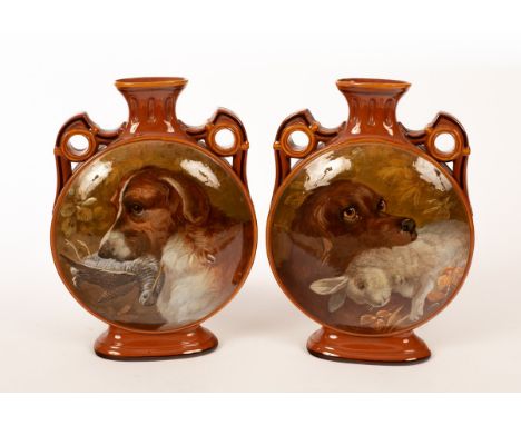 A pair of English pottery moon flasks, circa 1850, each decorated a retriever and game to one side and a pond scene to the ot