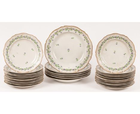 A set of six large circular dishes/soup plates with wavy moulded rim, decorated cornflowers and gilt dental border, 29cm diam