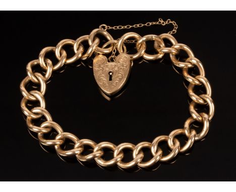 A 9ct gold curb link bracelet, S & K, with heart-shaped padlock clasp, approximately 29.3g CONDITION REPORT: Condition inform
