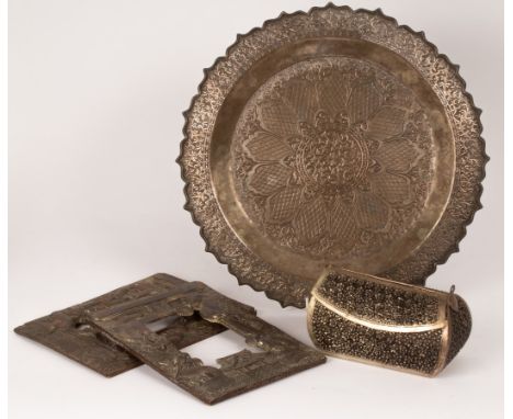 A Burmese white metal box, a plate and a pair of Japanese white metal photograph frames, the box decorated flowers, the frame