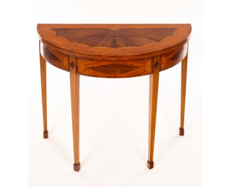 A late 18th Century satinwood card table, the top inlaid batswing patera, on square taper legs with spade feet, 92cm wide CON