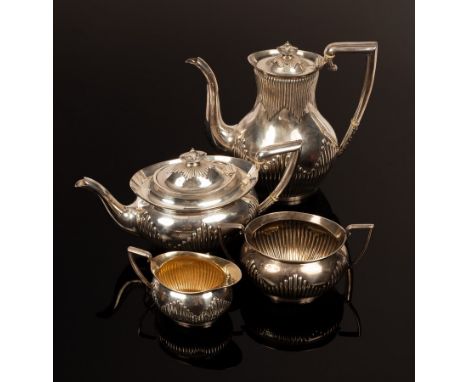 A four-piece silver tea and coffee service, BB, Birmingham 1901, half-ribbed with C scroll handles, comprising a teapot, a co