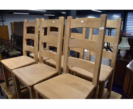 A set of six solid ladder back kitchen chairs