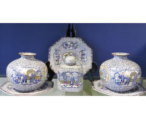 A suite of early 20th Century Adams Japan pattern pottery printed with figure and exotic bird vignettes, comprising a pair of
