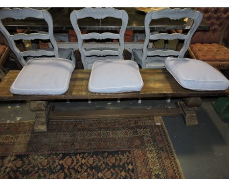 A Jacobean design painted wood bench seat on baluster end standards with uniting stretcher. L. 190cm.